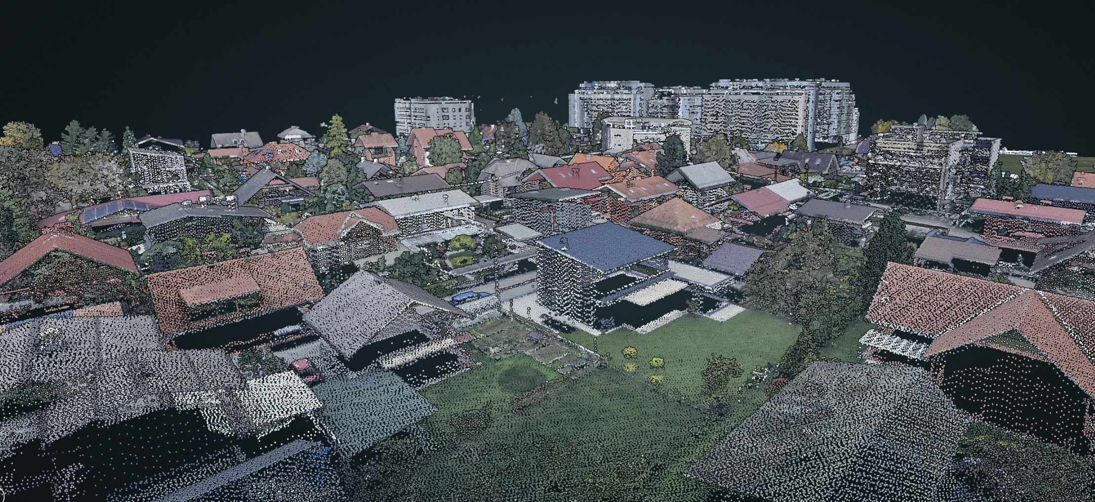 This image shows an RGB-colored point cloud, where each point in 3D space carries color information (red, green, blue). The colors help visualize real-world surfaces more clearly, adding context to the raw geometry. Such point clouds are often generated from photogrammetry or LiDAR combined with camera data, making them useful for tasks like object recognition, mapping, and scene reconstruction.