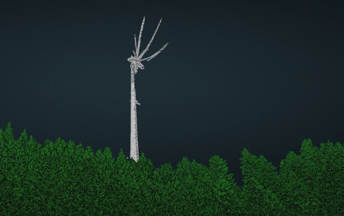 Point cloud of a wind turbine classified in grey above green vegetation